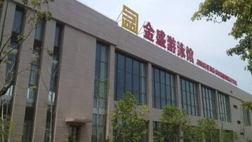 A modern building with a prominent sign.