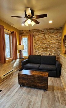 Standard Cabin, 2 Bedrooms (Blackspot) | Living area | LED TV, DVD player at Convict Lake Resort