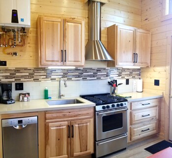 Deluxe Cabin, 2 Bedrooms (Speckled) | Private kitchen | Fridge, microwave, oven, stovetop at Convict Lake Resort