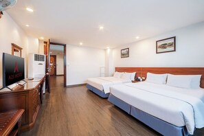 Habitación ejecutiva | Minibar, caja de seguridad en la habitación y cortinas blackout 