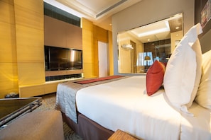 Suite presidencial | Ropa de cama de alta calidad y minibar 