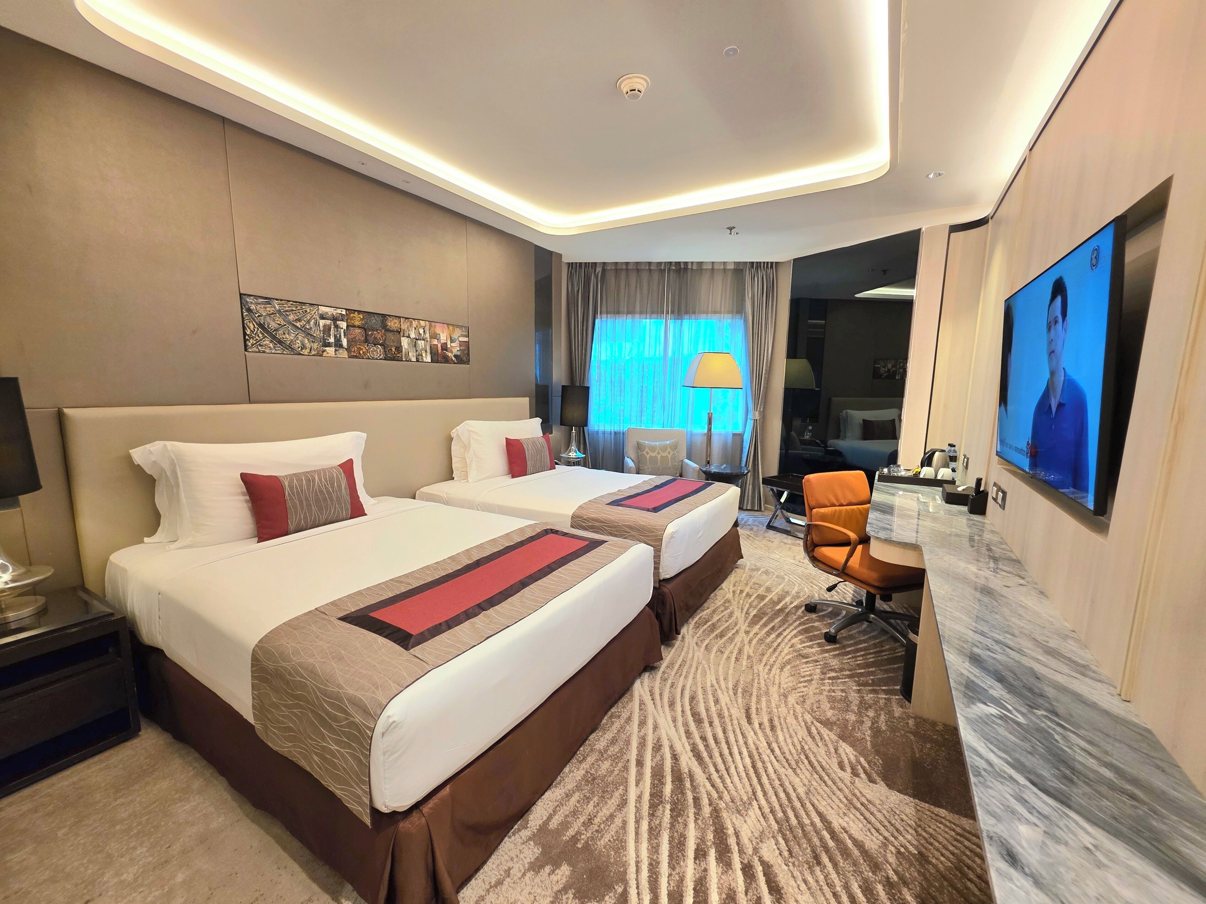 Deluxe Twin kamer | Luxe beddengoed, een minibar, een kluis op de kamer, gratis wifi