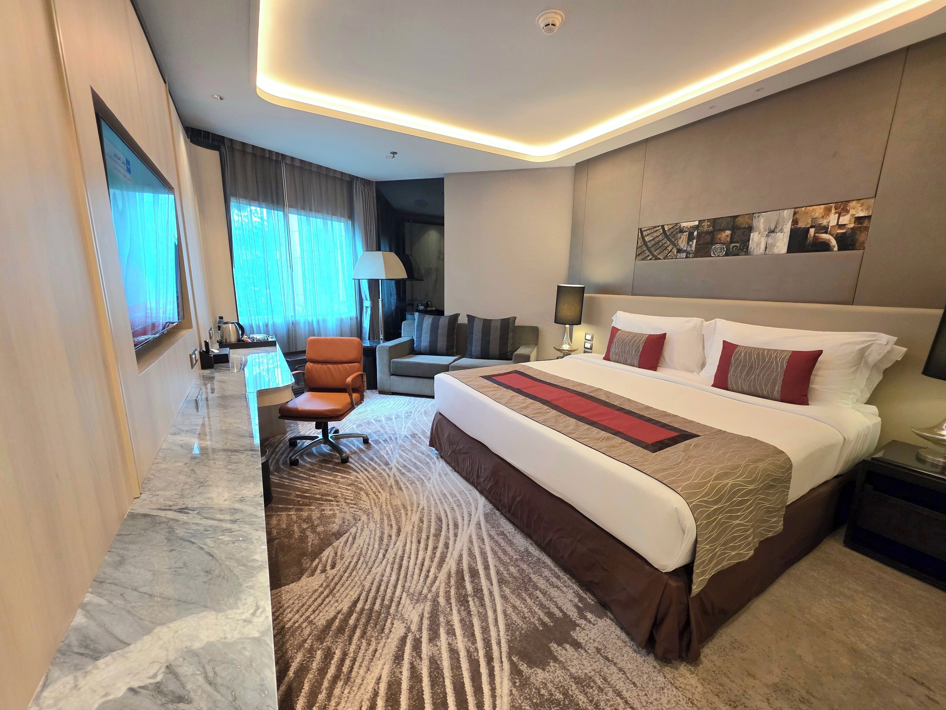 Deluxe King Room | Luxe beddengoed, een minibar, een kluis op de kamer, gratis wifi