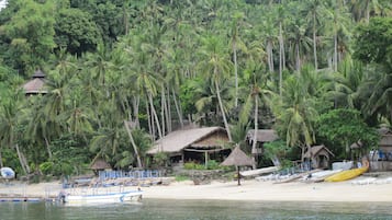 Private beach, white sand, beach umbrellas, scuba diving