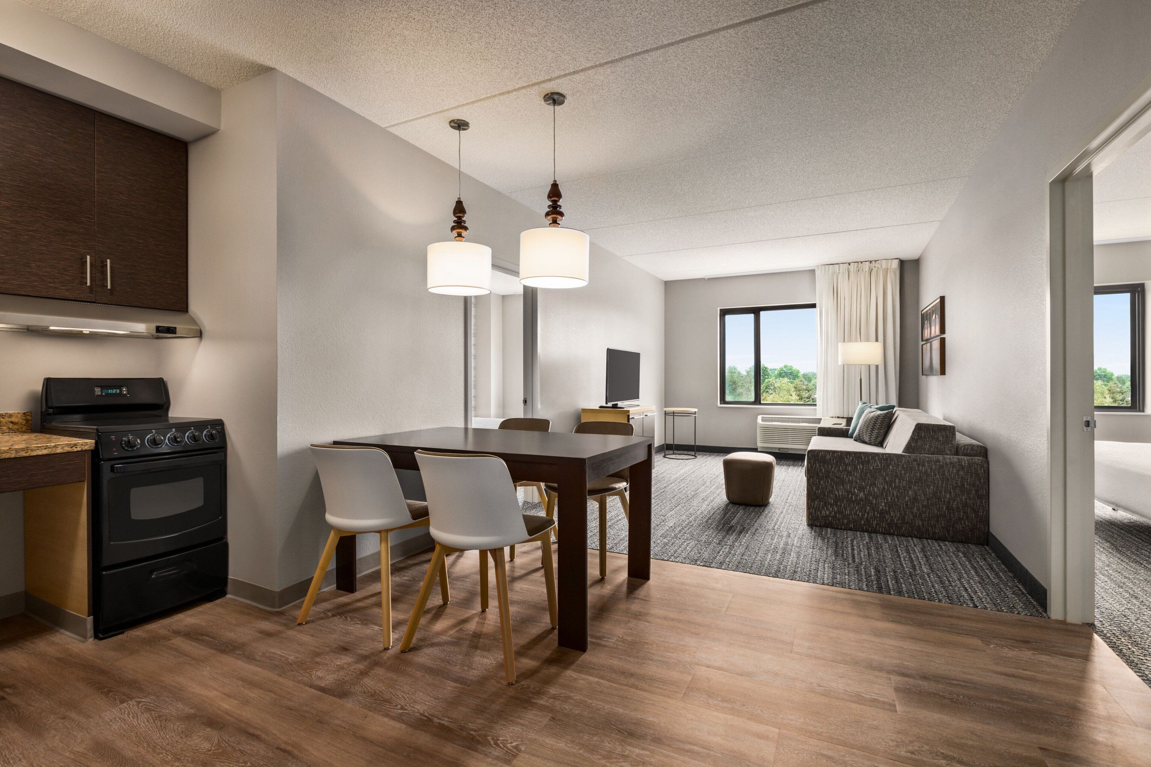 Suite, 2 Bedrooms | Private kitchen | Full-size fridge, microwave, stovetop, dishwasher