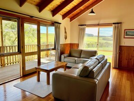 Two Level 2 Bedroom Wattle Cottage with Woodfire | Living area | Plasma TV, DVD player