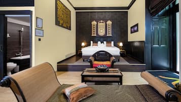 Suite Deluxe, vistas a la ciudad | Minibar, caja fuerte, escritorio y wifi gratis