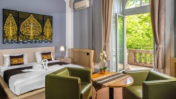 Deluxe Suite, City View | Minibar, in-room safe, desk, free WiFi