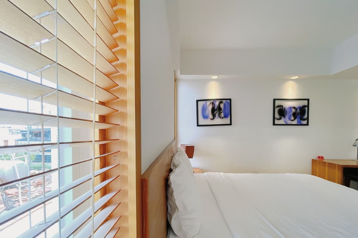 Superior Double Room, City View, Mountain View | Free minibar items, in-room safe, desk, blackout drapes