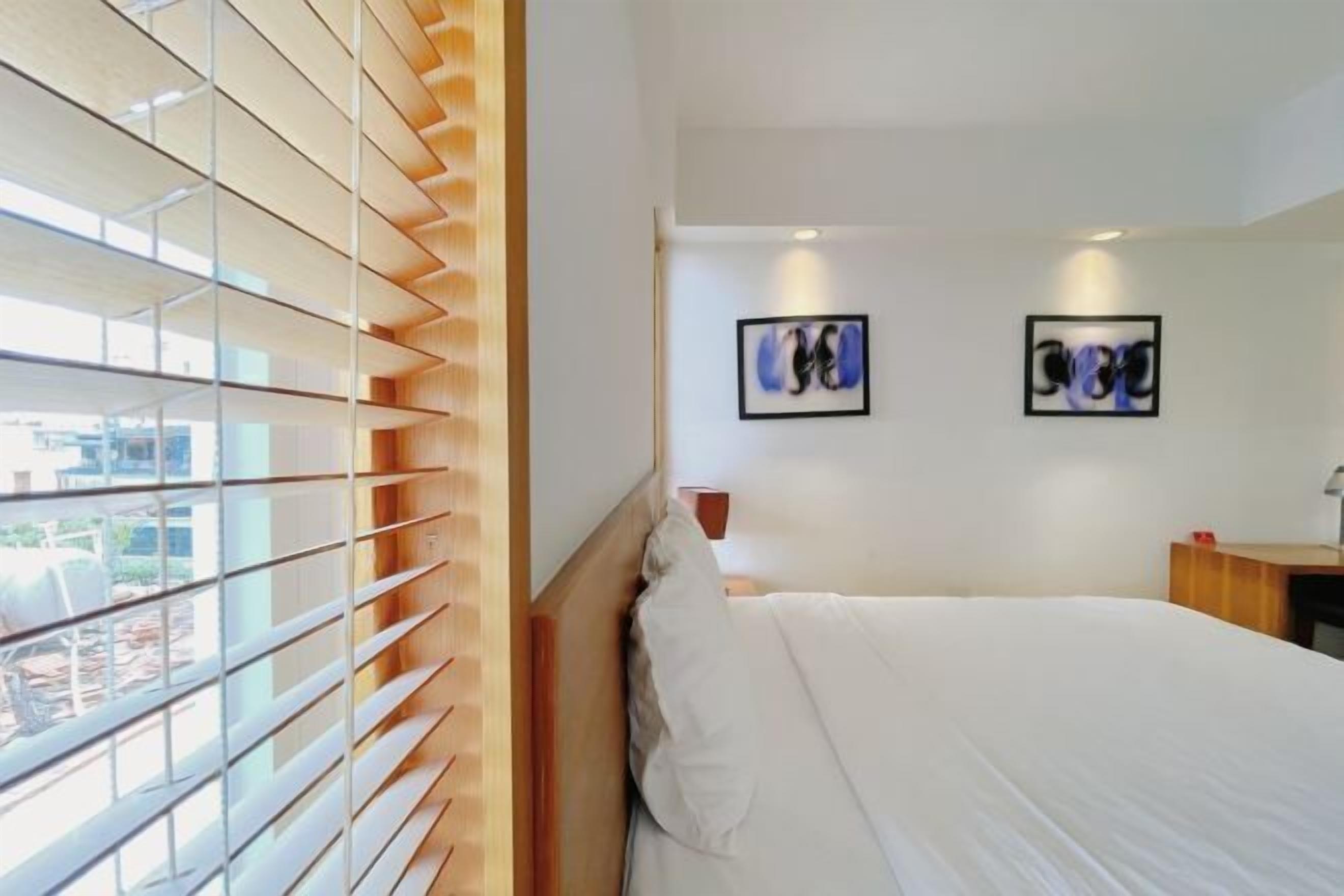 Free minibar items, in-room safe, desk, blackout curtains