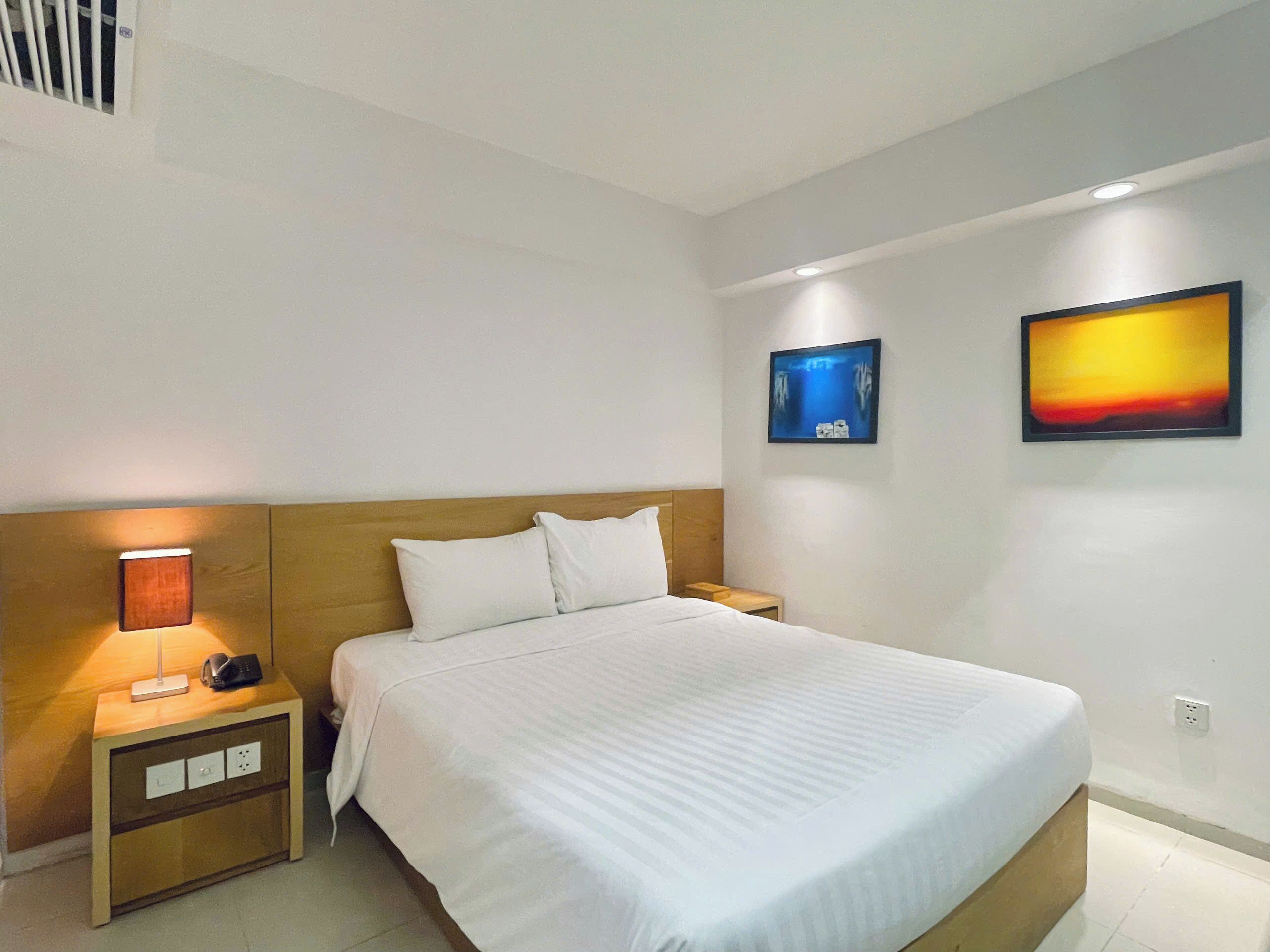 Standard Double Room | Free minibar items, in-room safe, desk, blackout drapes