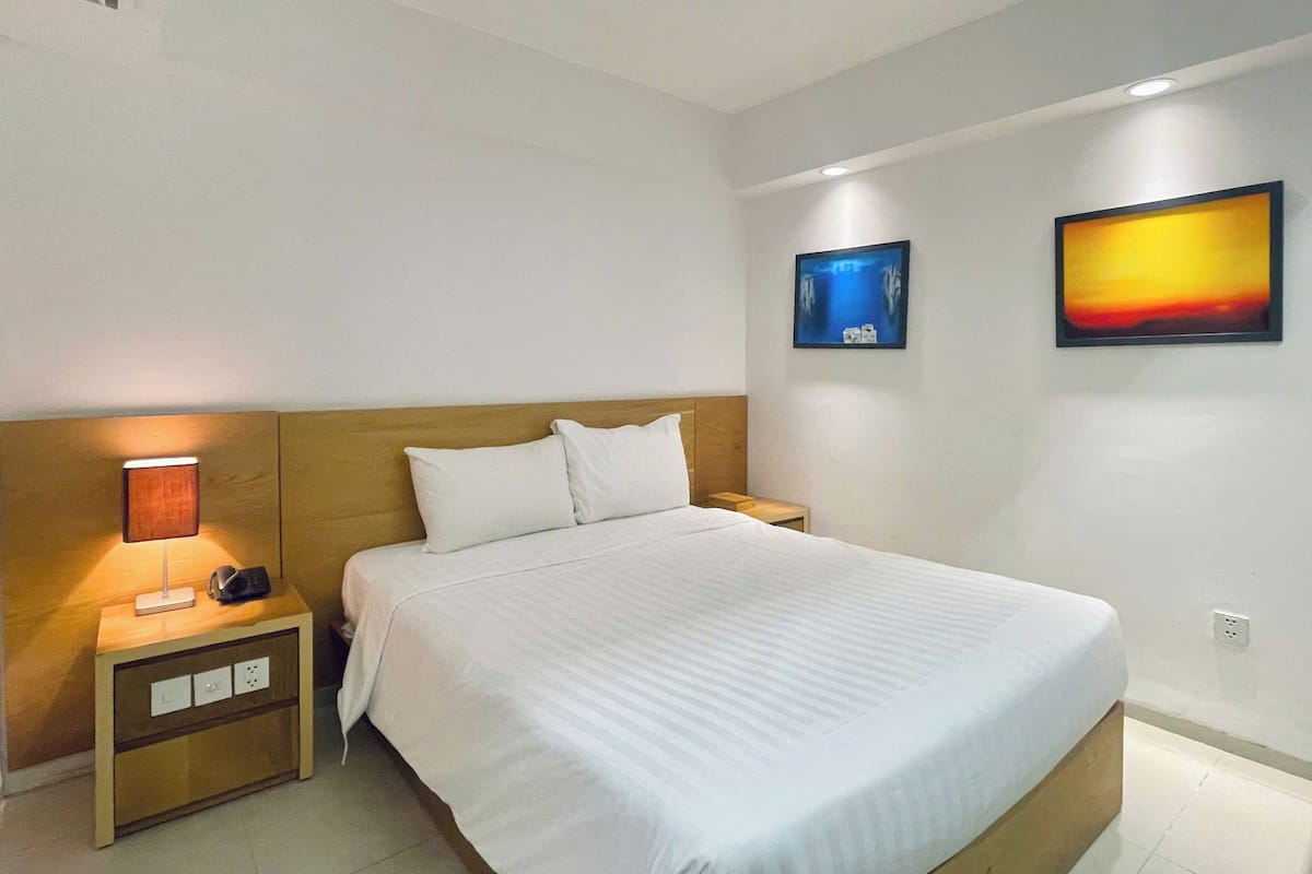 Standard Double Room | Free minibar items, in-room safe, desk, blackout drapes
