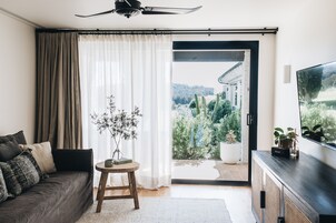 Superior Bungalow | Living area | Flat-screen TV, DVD player