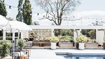 Outdoor pool, pool umbrellas, sun loungers