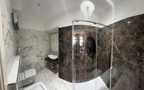 Quadruple Room, Sea View | Bathroom | Shower, hair dryer, towels