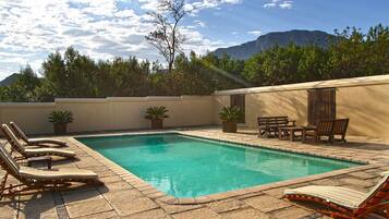 Outdoor pool, sun loungers