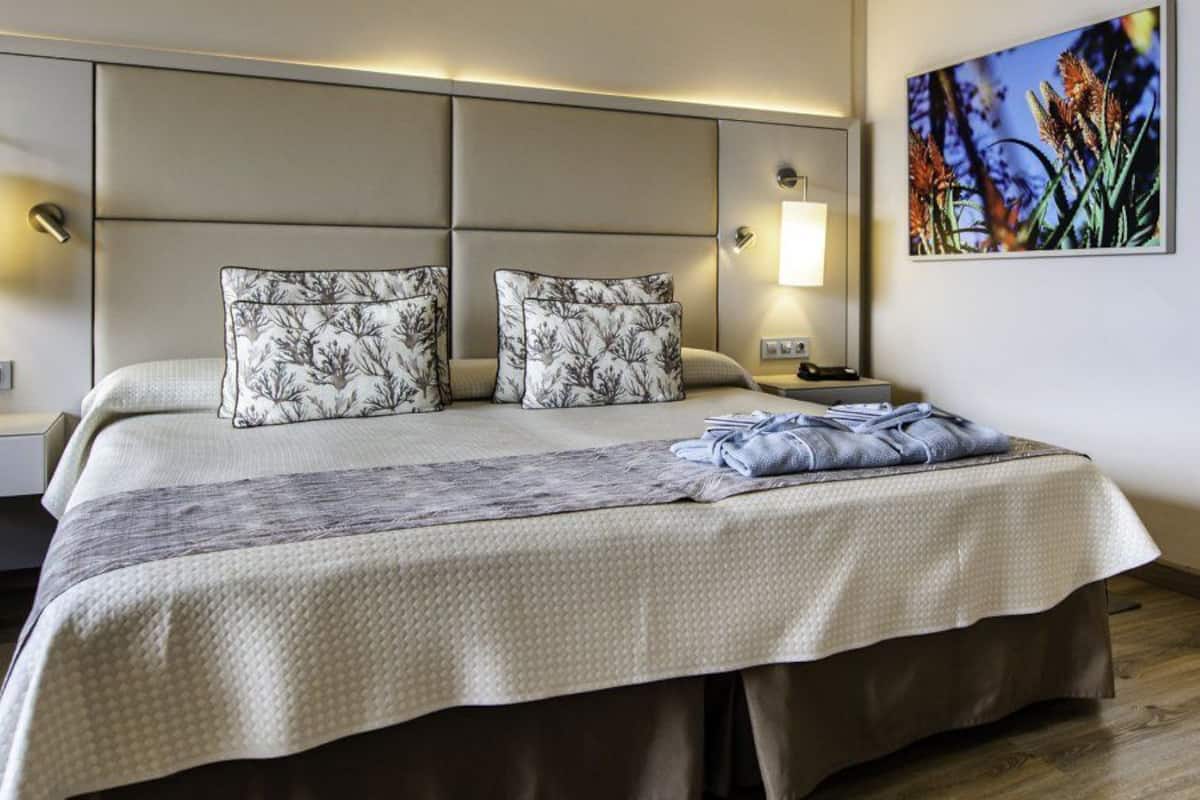 Minibar, desk, blackout drapes, iron/ironing board
