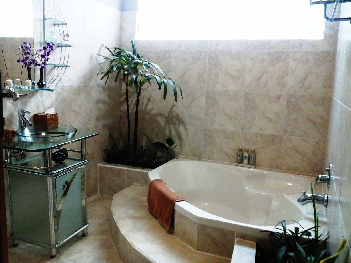 villa, 2 bedrooms, ocean view | bathroom | combined shower/bathtub, free toiletries, hair dryer, towels