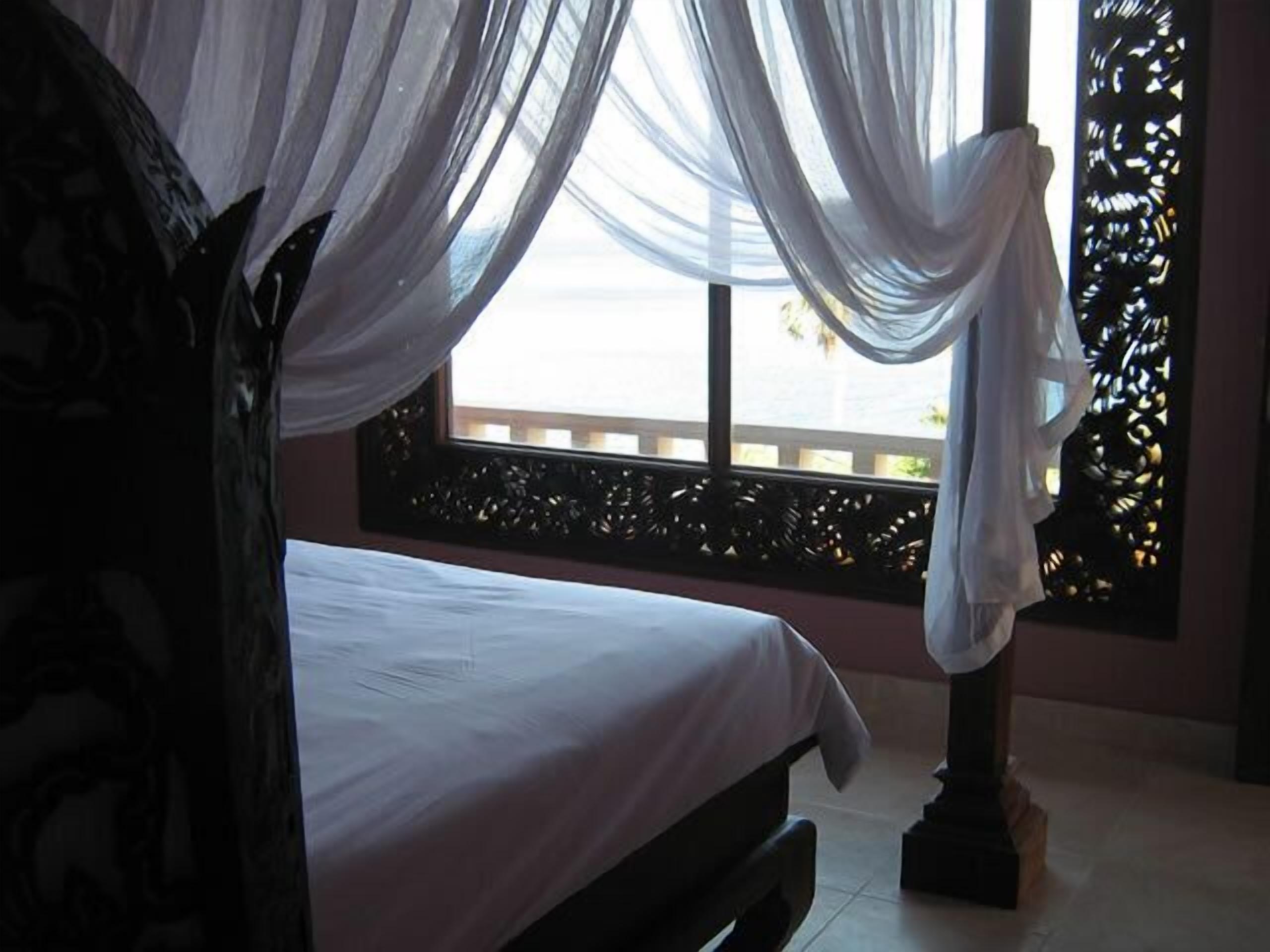 villa, 1 bedroom, ocean view | 1 bedroom, minibar, in-room safe, desk