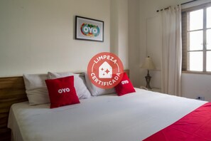 Habitación doble superior | Minibar, tabla de planchar con plancha, wifi gratis y ropa de cama