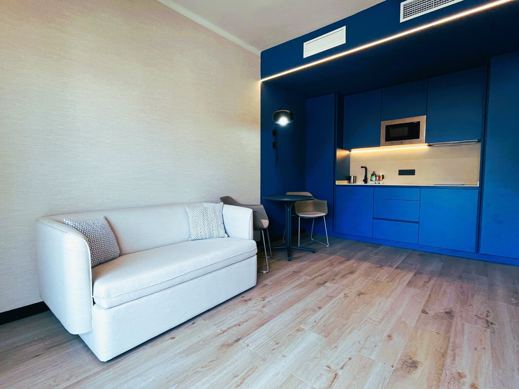 Deluxe Suite, 2 Bedrooms, Terrace | Living area | 50-inch flat-screen TV with cable channels, TV