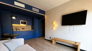 Suite – deluxe, 2 soverom, terrasse | Oppholdsområde