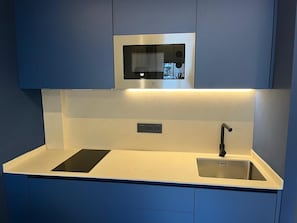 Mini-fridge, microwave, stovetop, electric kettle