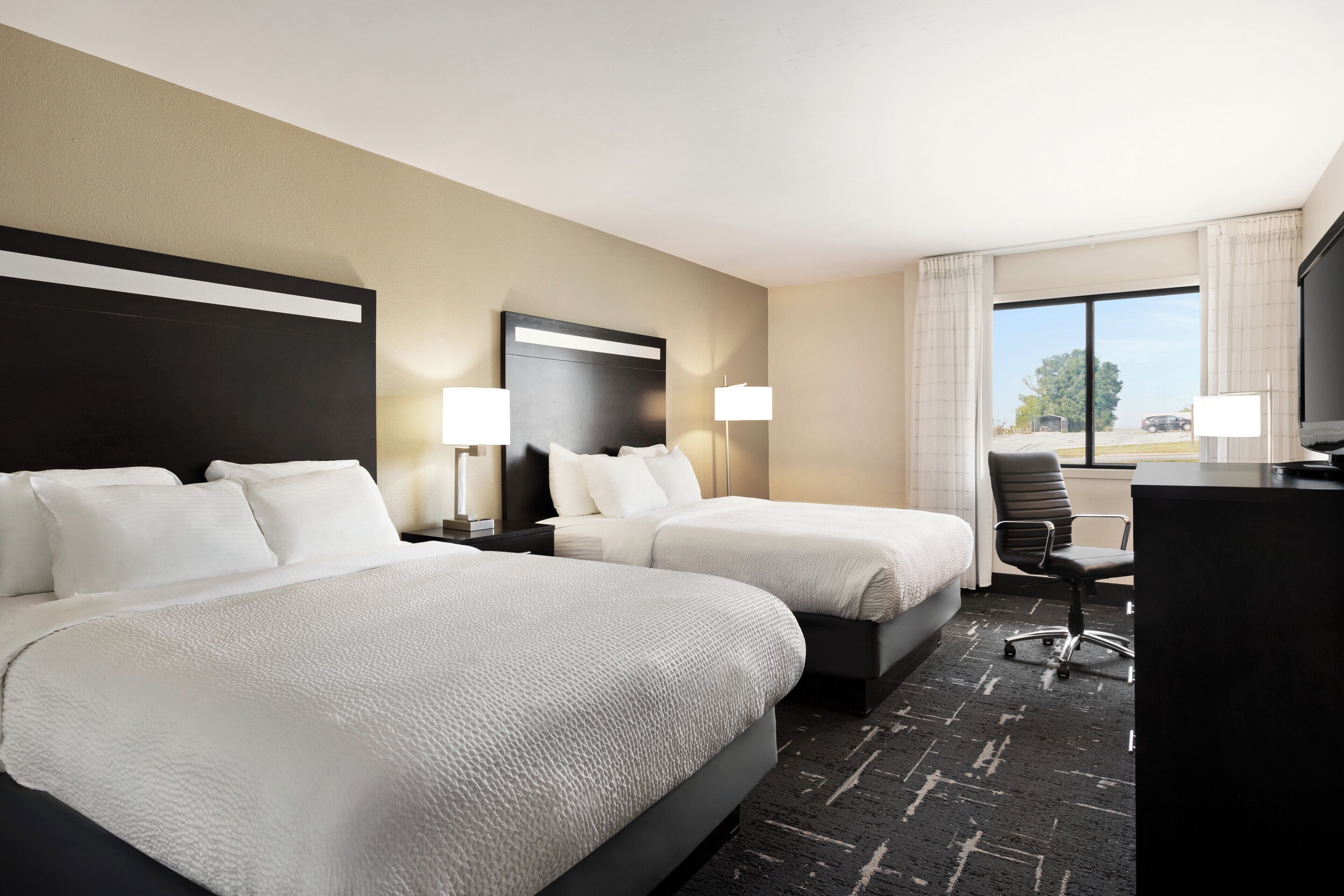 double queen second floor | down duvets, desk, laptop workspace, iron/ironing board