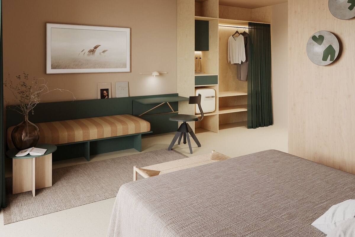 A modern bedroom with a bed, a desk, a chair, a bench, a ceiling fan, and a wardrobe.