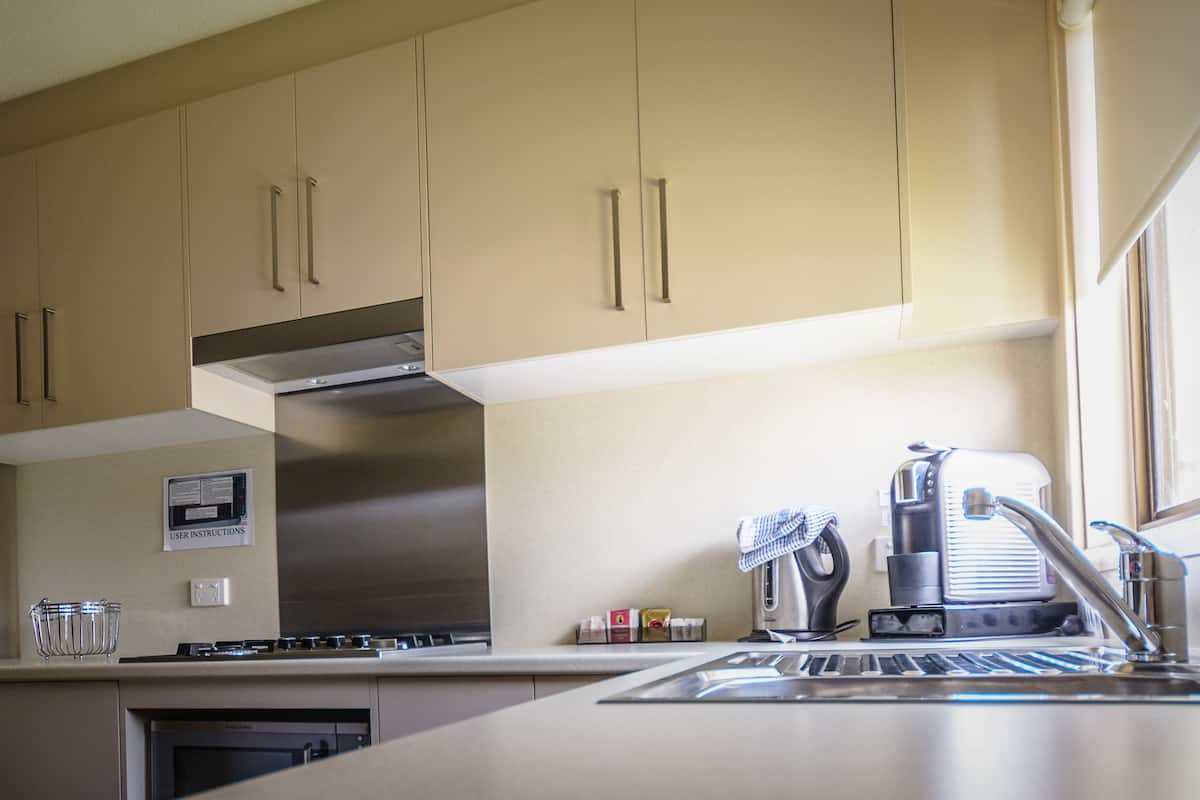 2 bedroom air conditioned cabin | private kitchen | full-sized fridge, microwave, stovetop, coffee/tea maker