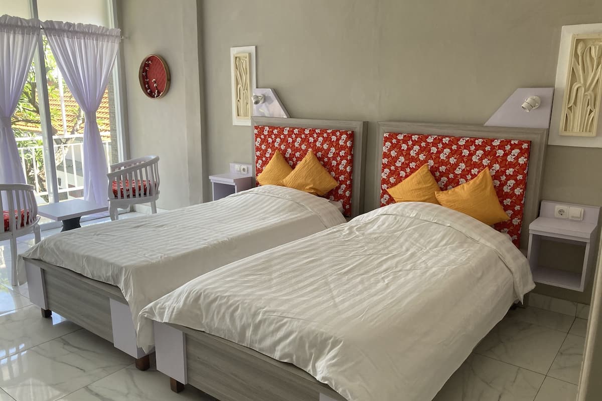 Habitación Deluxe con 2 camas individuales, 2 camas individuales, Terraza, frente al mar | Ropa de cama de alta calidad y camas Tempur-Pedic