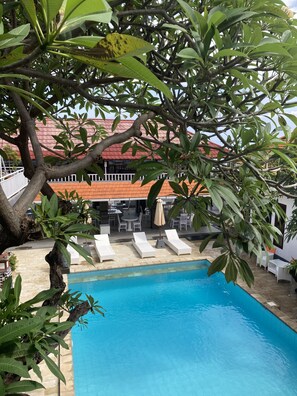 Outdoor pool, open 8:00 AM to 10:00 PM, pool umbrellas, pool loungers