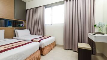 Down comforters, blackout drapes, free WiFi, bed sheets