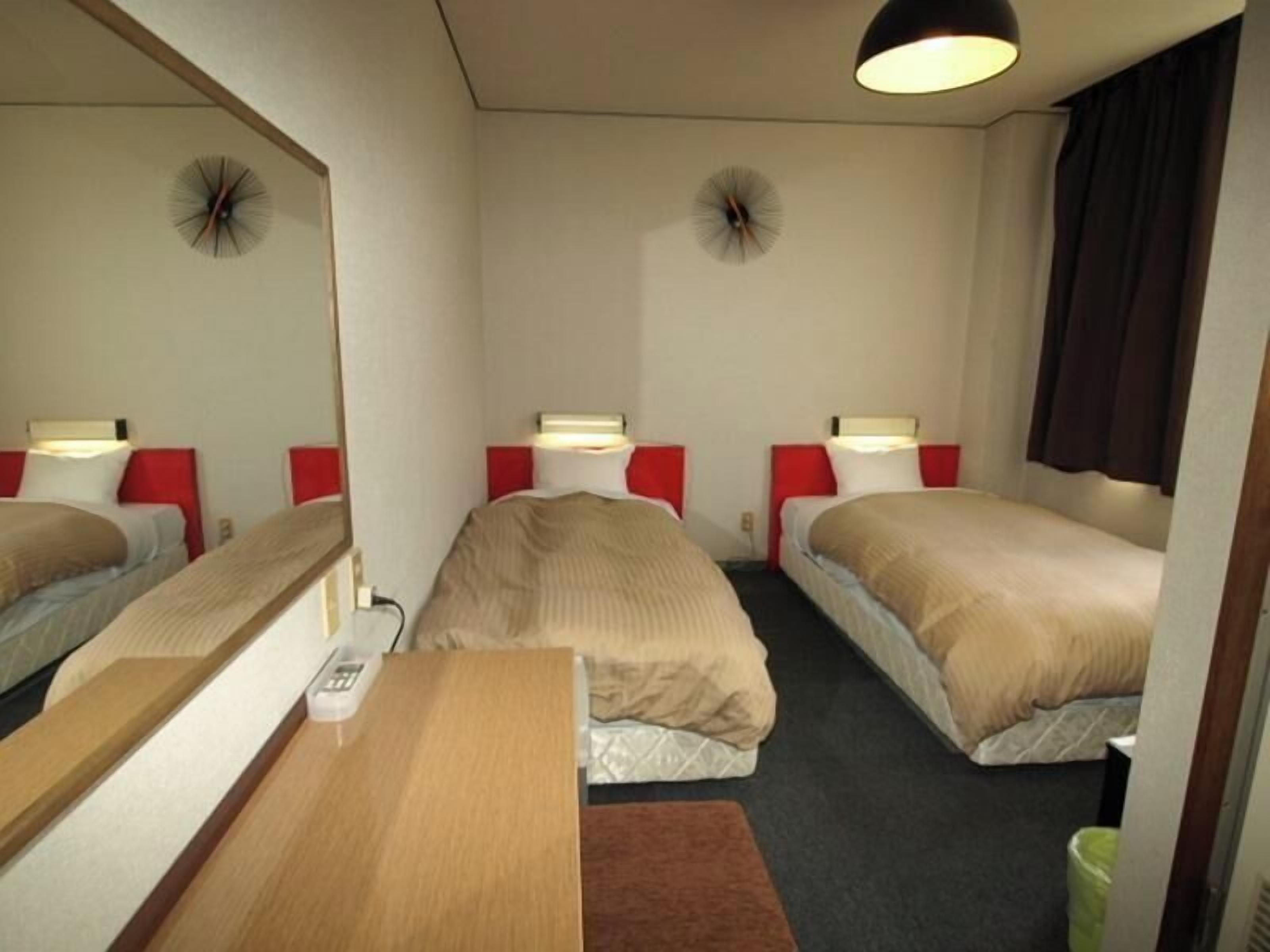 Desk, blackout curtains, free WiFi, bed sheets