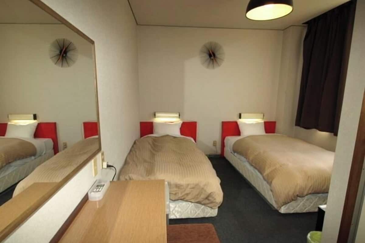 Desk, blackout curtains, free WiFi, bed sheets