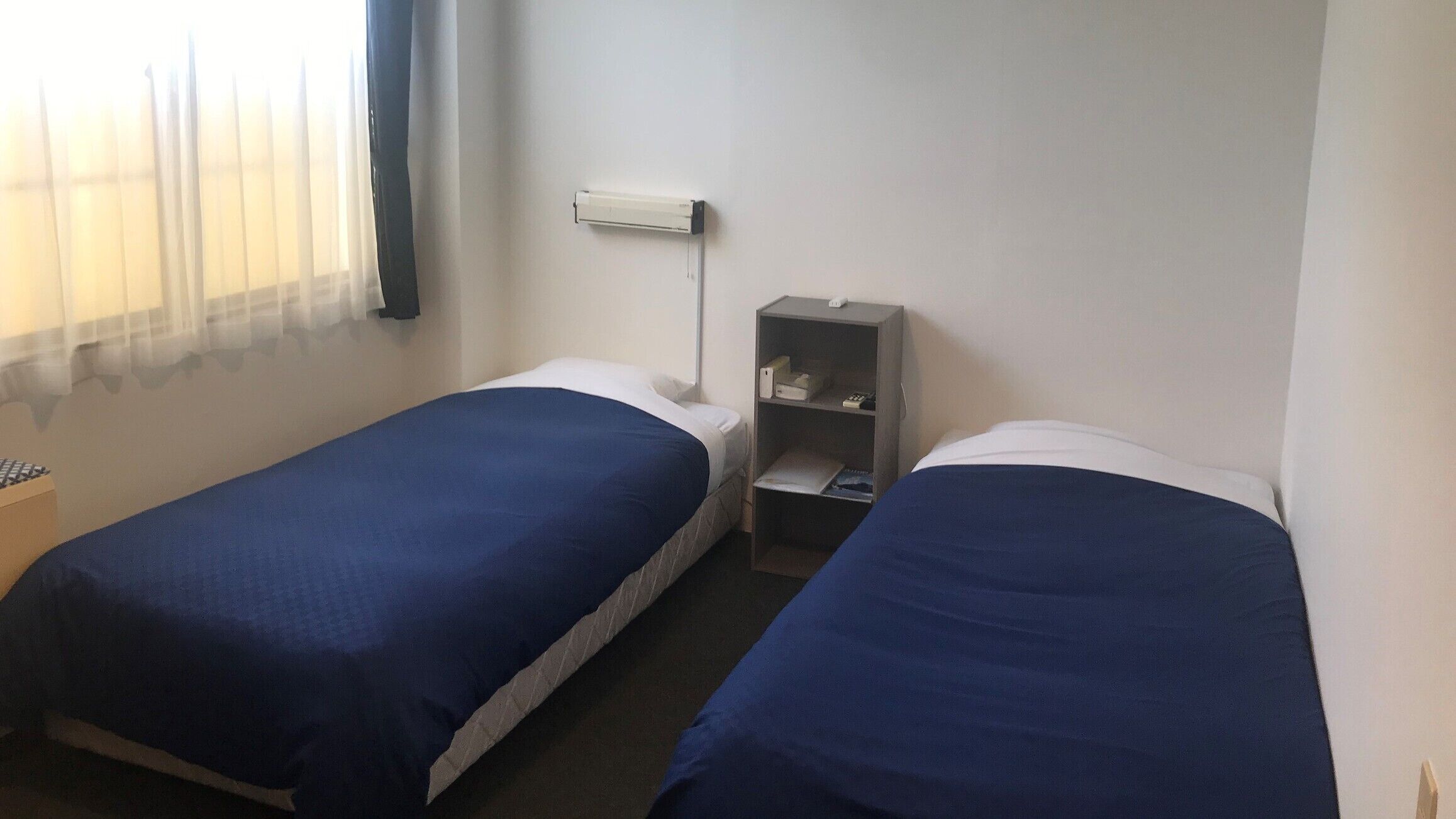 Desk, blackout curtains, free WiFi, bed sheets