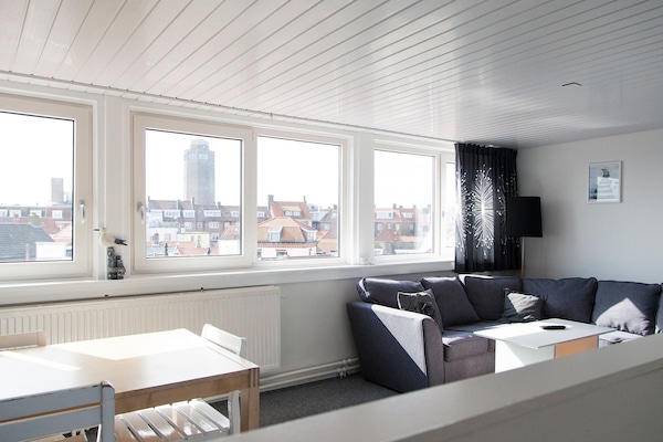 Standard Apartment, 2 Bedrooms, City View | Living room | Flat-screen TV