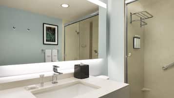 Designer toiletries, hair dryer, towels