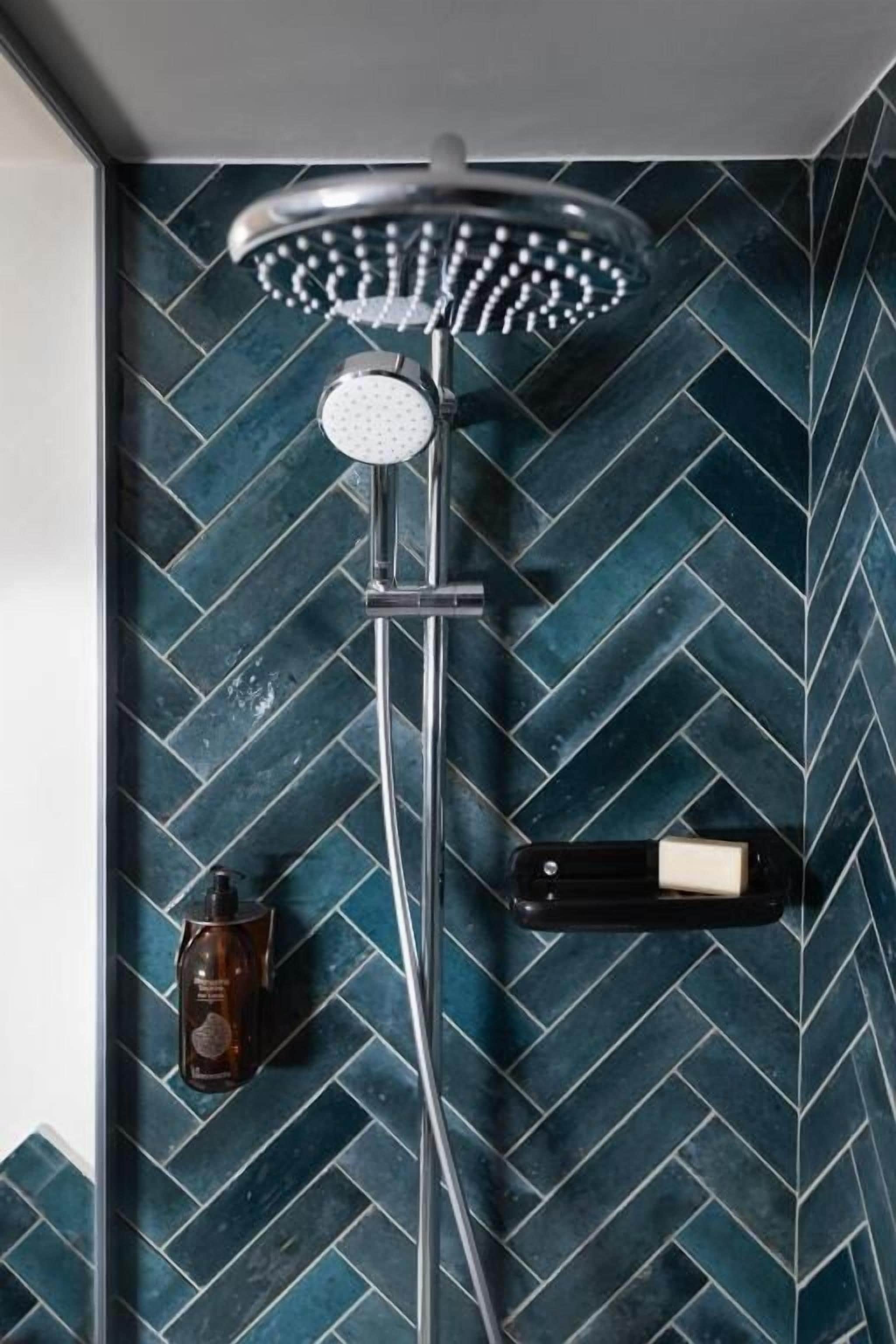 rainfall showerhead, hair dryer, towels, soap