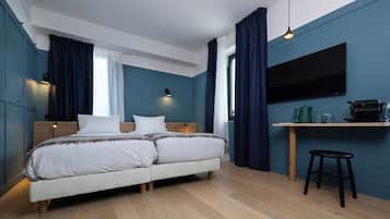Caja fuerte, sistema de insonorización, wifi gratis y ropa de cama