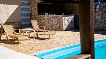 Outdoor pool, pool umbrellas, sun loungers