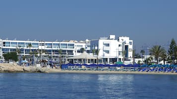 On the beach, sun-loungers, beach umbrellas