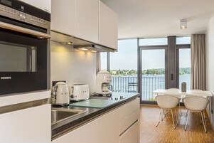 Coffee/tea maker, fridge, microwave, oven