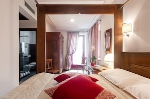 Egyptian cotton sheets, premium bedding, down duvets, memory-foam beds