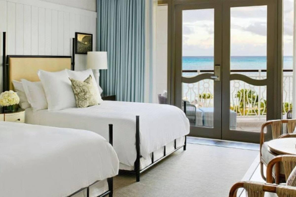 Luxe beddengoed, een minibar, een kluis op de kamer, een bureau