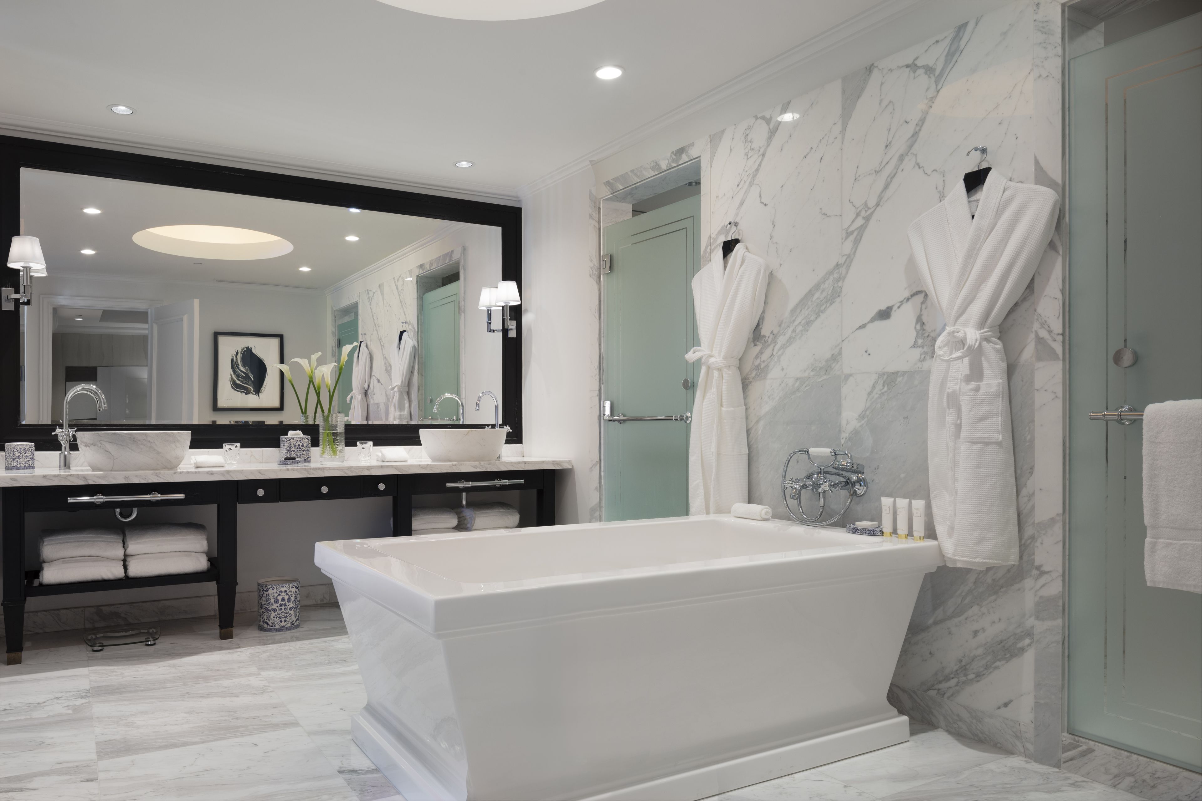 separate bathtub and shower, deep-soaking bathtub, rainfall showerhead