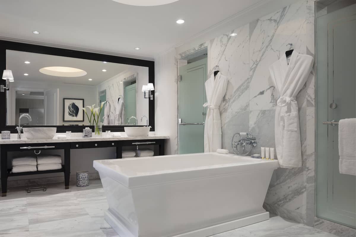 separate bathtub and shower, deep-soaking bathtub, rainfall showerhead