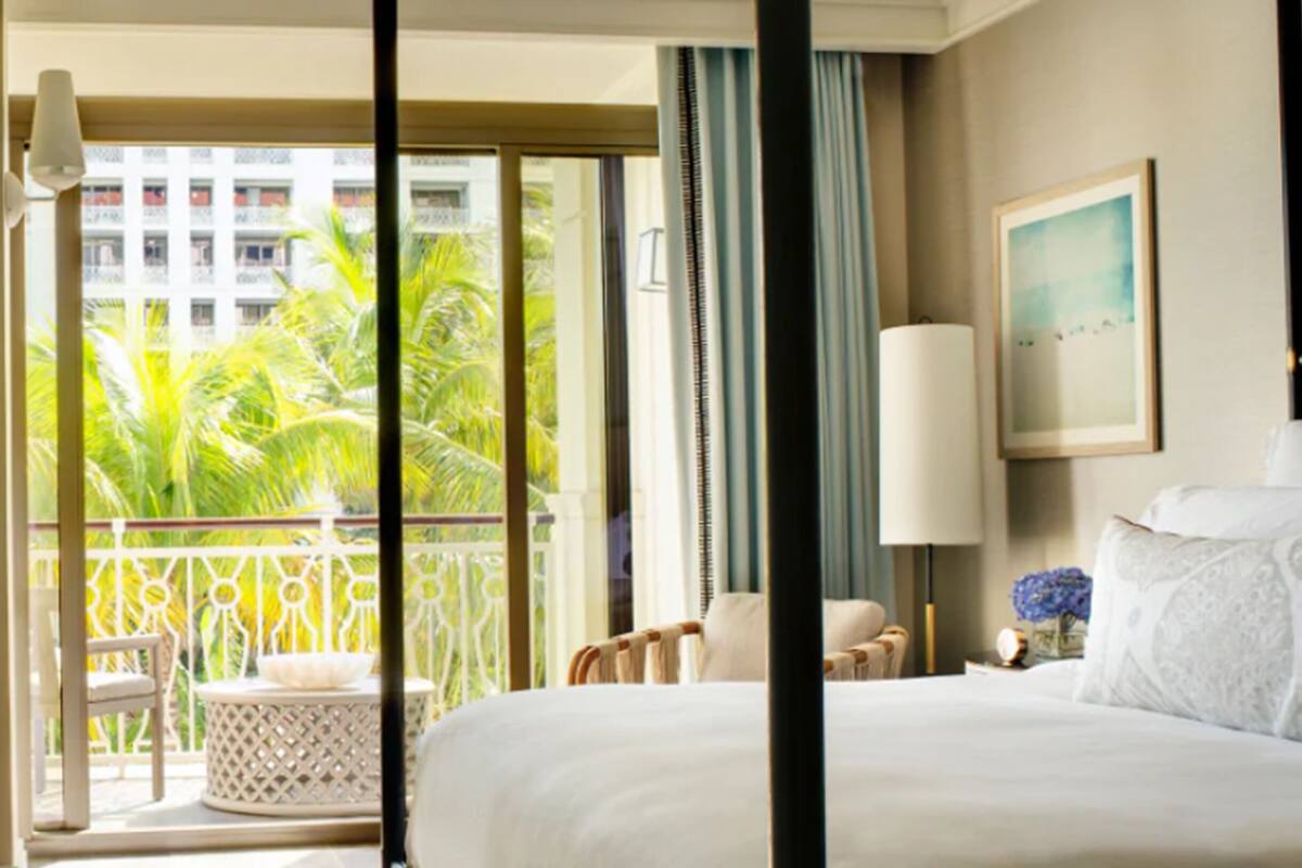 Luxe beddengoed, een minibar, een kluis op de kamer, een bureau