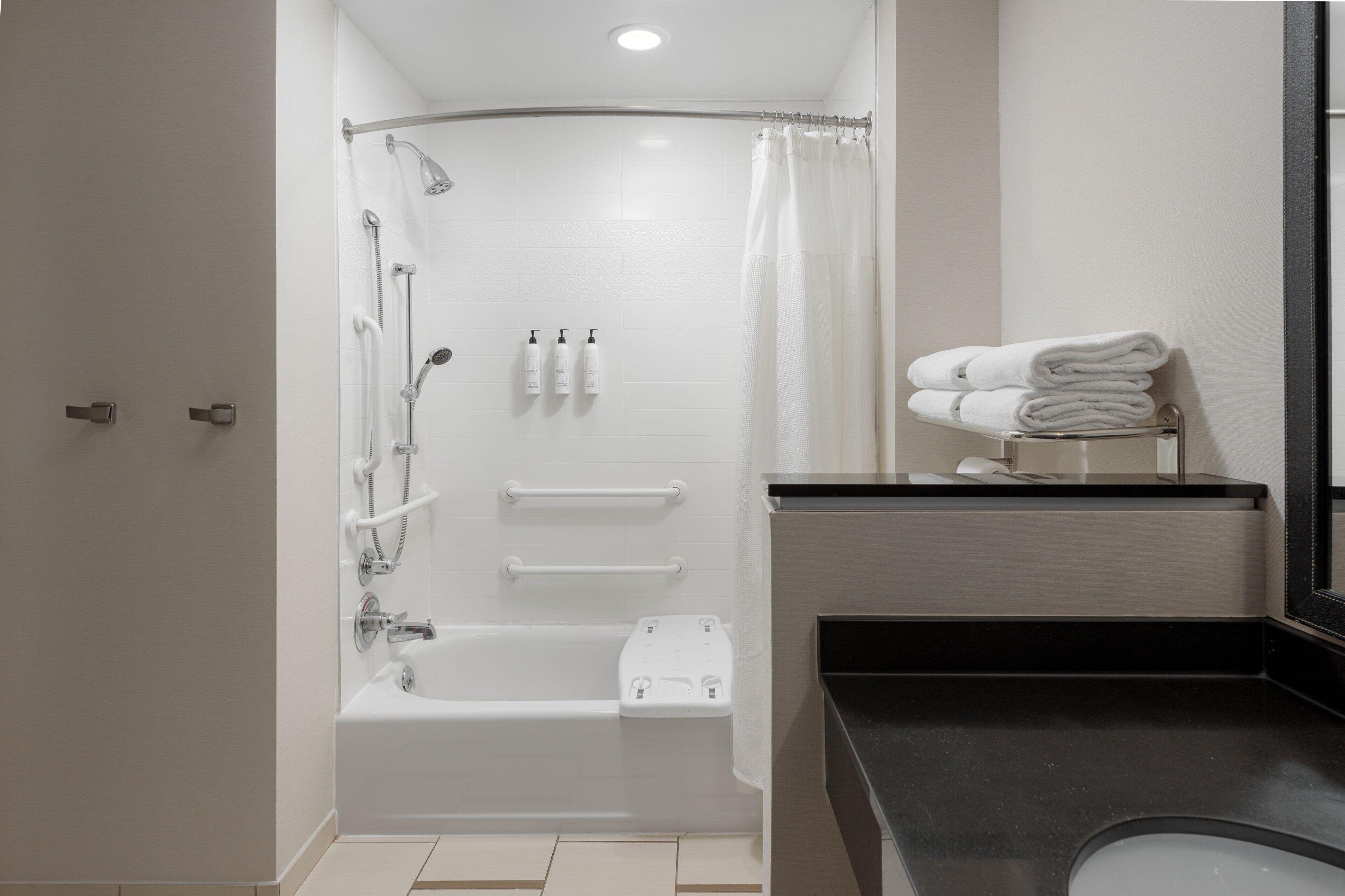 combined shower/bathtub, free toiletries, hair dryer, towels