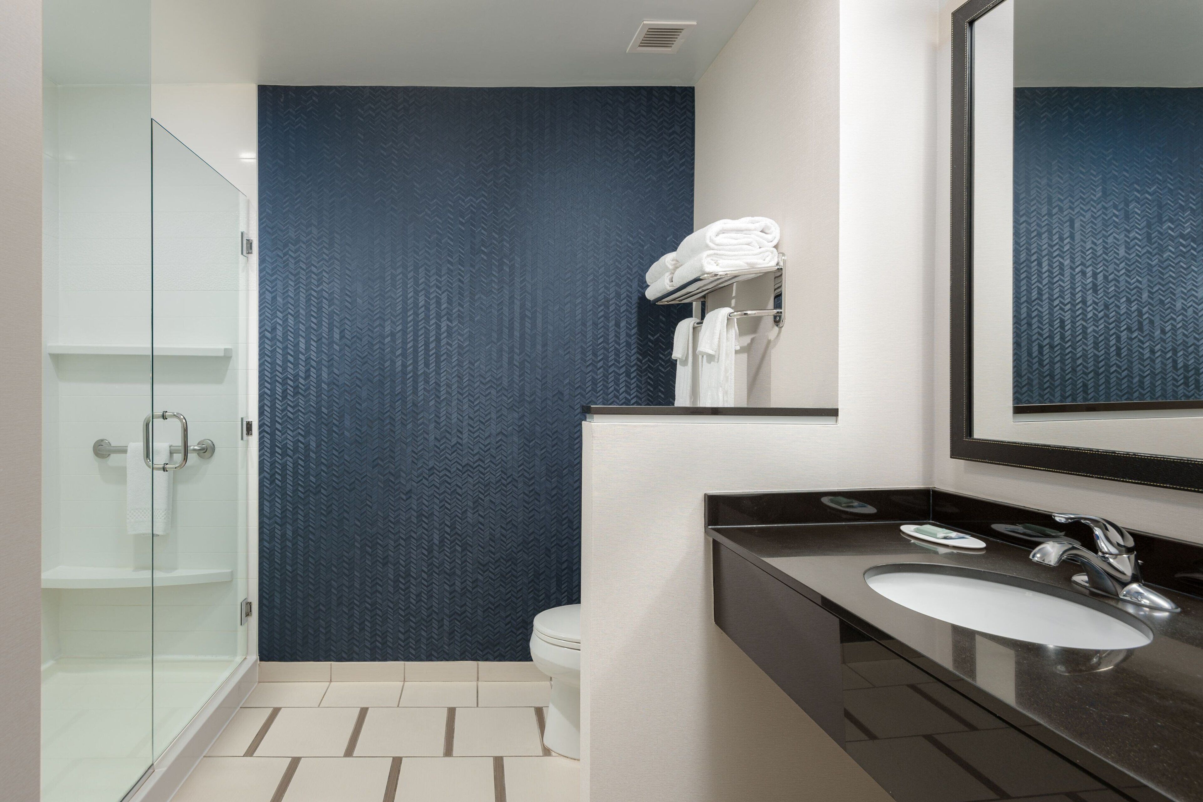 combined shower/bathtub, free toiletries, hair dryer, towels